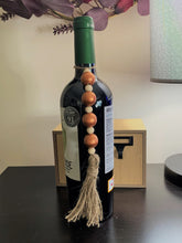 Load image into Gallery viewer, Copper wood beaded bottle ornament
