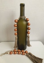 Load image into Gallery viewer, Copper wood beaded bottle ornament
