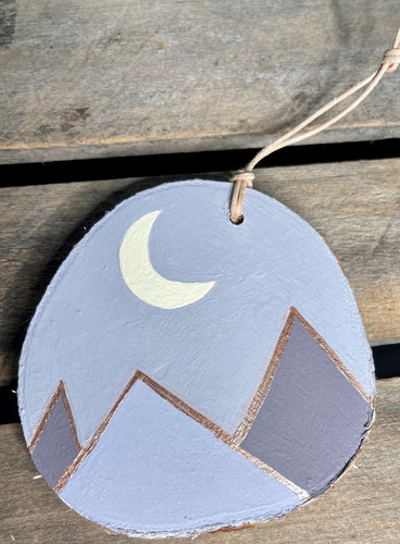 Hand painted mountain scene on birch wood slice with leather loop