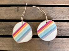 Load image into Gallery viewer, Hand painted rainbow scene on birch wood slice with leather loop
