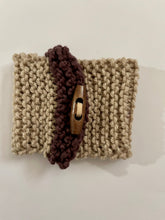 Load image into Gallery viewer, Hand knitted brown and burgundy coffee koozie with wood toggle button for decoration.
