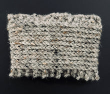Load image into Gallery viewer, Hand knitted gray coffee koozie with wood toggle button for decoration.
