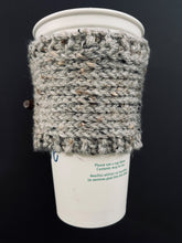 Load image into Gallery viewer, Hand knitted gray coffee koozie with wood toggle button for decoration.
