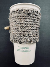 Load image into Gallery viewer, Hand knitted gray coffee koozie with wood toggle button for decoration.

