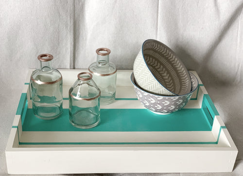 Beige hand painted wooden serving tray with turquoise stripes.