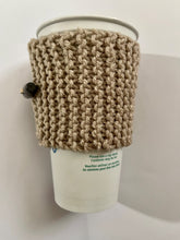 Load image into Gallery viewer, Hand knitted light brown coffee koozie with wood toggle button for decoration.
