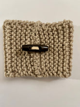 Load image into Gallery viewer, Hand knitted light brown coffee koozie with wood toggle button for decoration.
