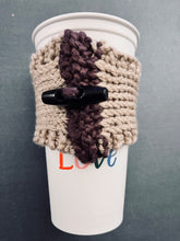 Load image into Gallery viewer, Hand knitted light brown with burgundy stripe and wood toggle button for decoration.

