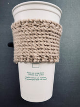 Load image into Gallery viewer, Hand knitted light brown with burgundy stripe and wood toggle button for decoration.
