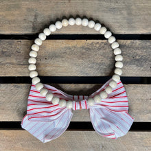 Load image into Gallery viewer, Natural Wood Bead Wreath with Read and White Stripe Bow
