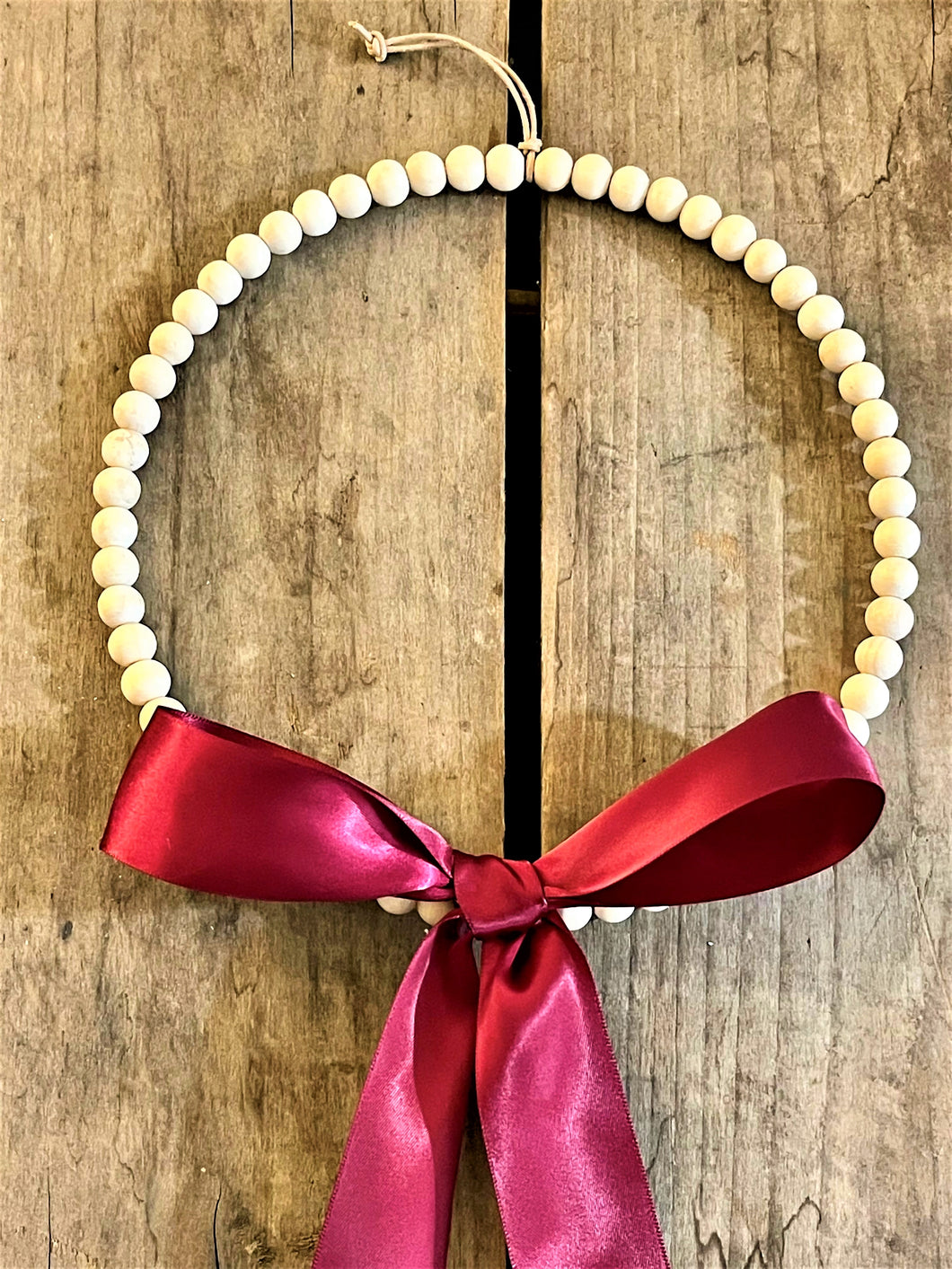 Natural Wood Bead Wreath with Red Silk Bow