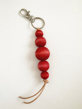 Load image into Gallery viewer, Red Dyed Wood Beaded Keyring with Leather Tassel
