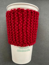 Load image into Gallery viewer, Hand knitted red scarf coffee koozie with red tassel.
