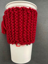 Load image into Gallery viewer, Hand knitted red scarf coffee koozie with red tassel.
