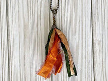 Load image into Gallery viewer, Green and orange silk tassel on antique brass ball chain
