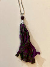 Load image into Gallery viewer, Purple and green silk tassel necklace with lava stone bead
