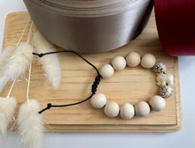 Load image into Gallery viewer, Stackable natural wood bead bracelet on black cord
