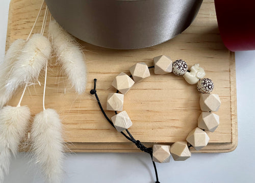 Stackable natural wood bead bracelet on black cord