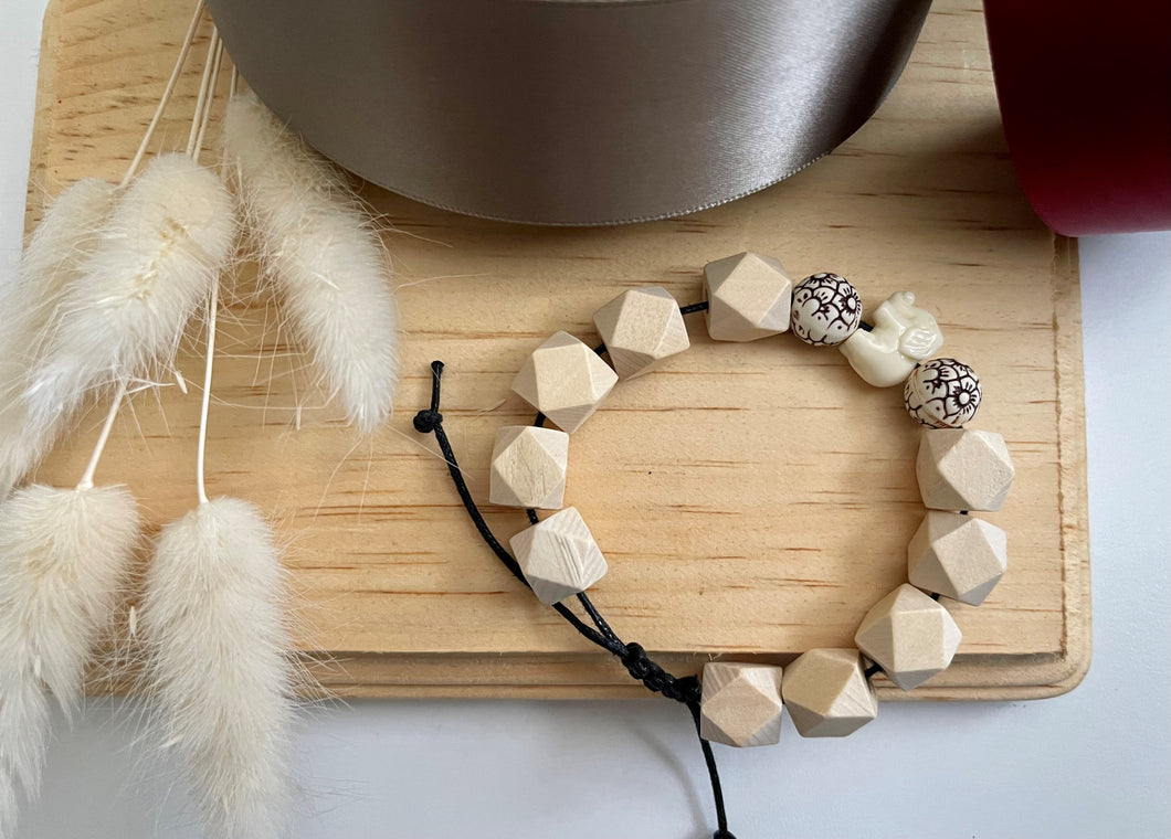 Stackable natural wood bead bracelet on black cord