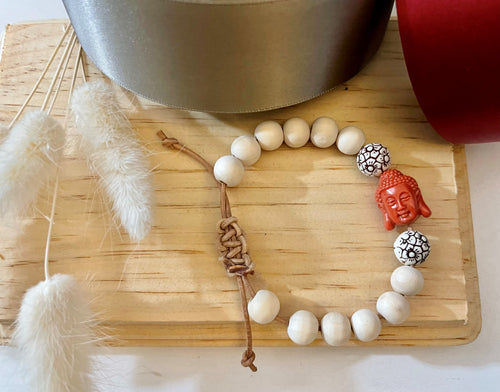 Stackable natural wood bead bracelet on leather cord