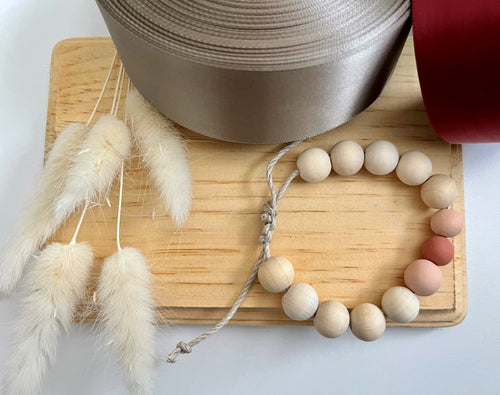 Stackable natural wood bead bracelet on hemp cord