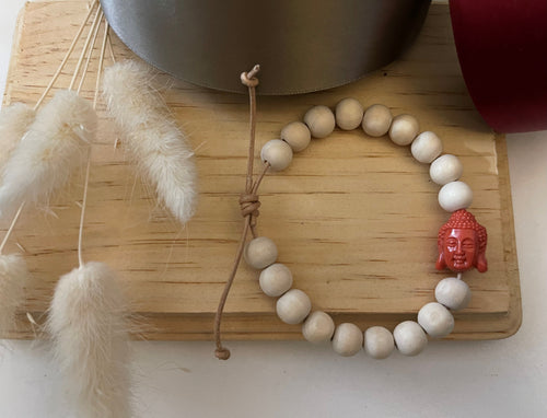 Stackable natural wood bead bracelet on leather cord