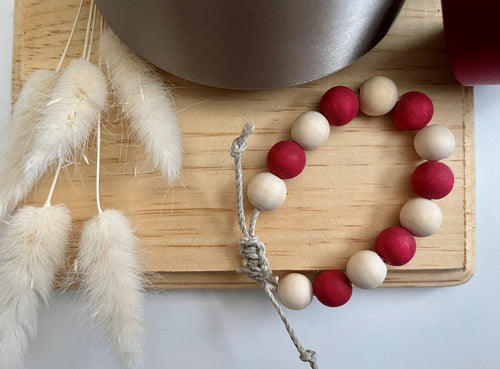 Stackable natural wood bead bracelet on hemp cord