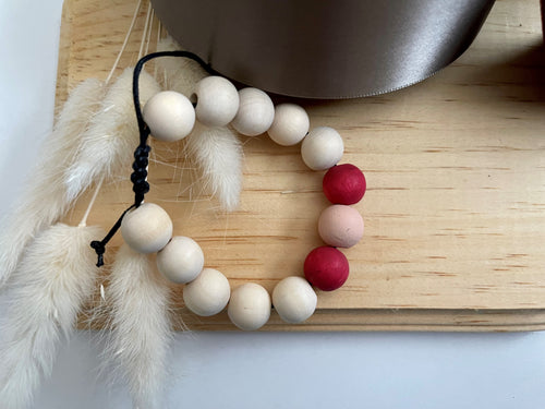 Stackable natural wood bead bracelet on black cord