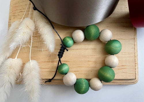 Stackable natural wood bead bracelet on black cord
