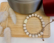 Load image into Gallery viewer, Stackable natural wood bead bracelet on leather cord

