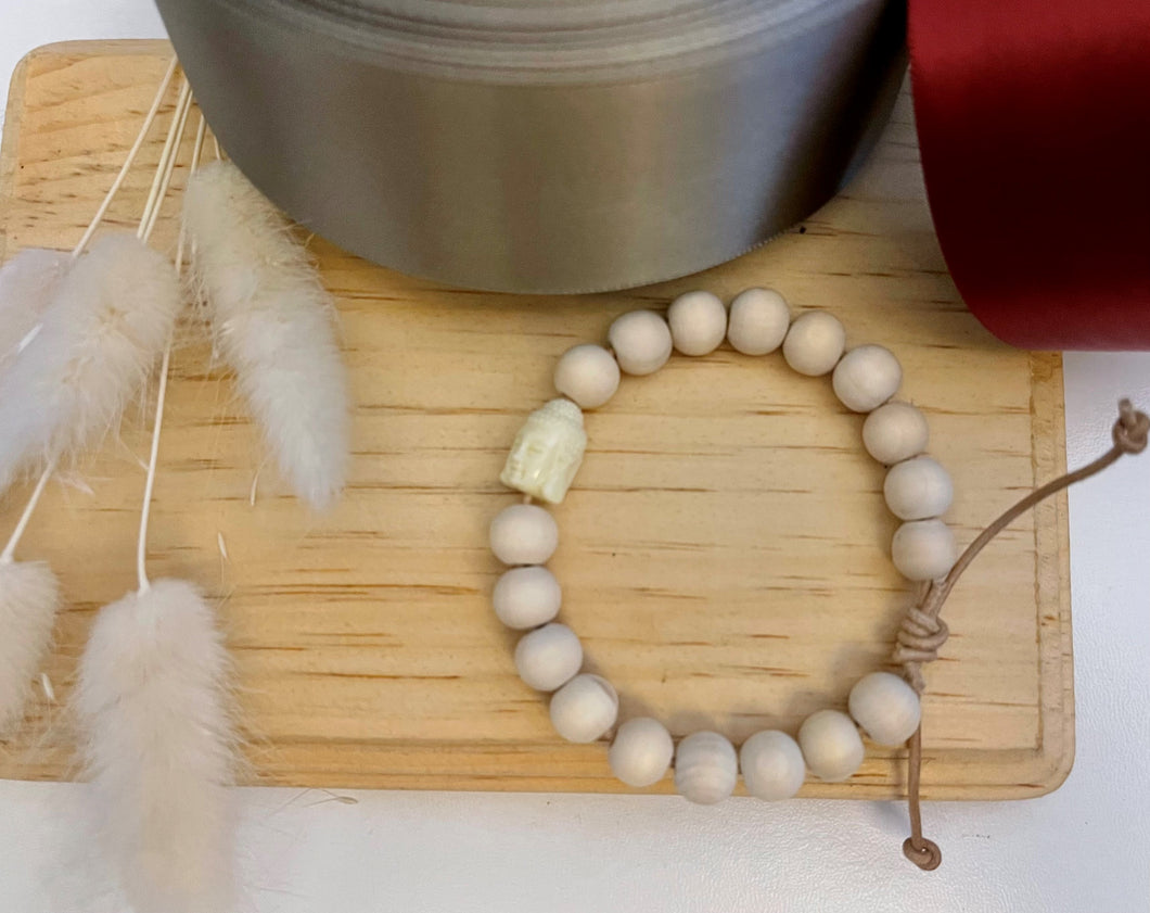 Stackable natural wood bead bracelet on leather cord