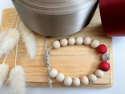Stackable natural wood bead bracelet on hemp cord