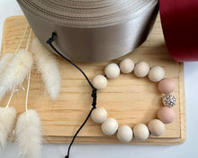 Load image into Gallery viewer, Stackable natural wood bead bracelet on black cord
