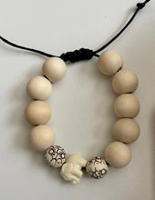Load image into Gallery viewer, Stackable natural wood bead bracelet on black cord
