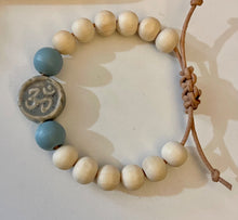 Load image into Gallery viewer, Stackable natural wood bead bracelet on leather cord
