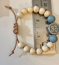 Load image into Gallery viewer, Stackable natural wood bead bracelet on leather cord
