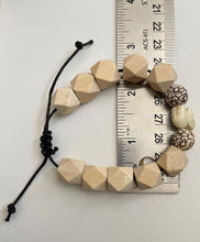 Load image into Gallery viewer, Stackable natural wood bead bracelet on black cord
