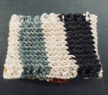 Load image into Gallery viewer, Hand knitted coffee koozie with beige, mustard, green and black with wood toggle button for decoration.
