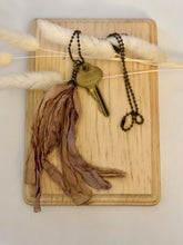 Load image into Gallery viewer, Vintage key and silk tassel necklace
