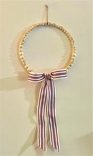 Load image into Gallery viewer, Wood Bead Wreath with Large Red and White Bow
