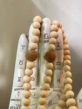 Load image into Gallery viewer, Wood and cork bead and silk tassel necklace

